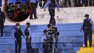 Aficionados ocasionaron un zafarrancho tras el partido entre Honduras y Estados Unidos en el estadio Olímpico. Una mujer sufrió un fuerte golpe en su frente.