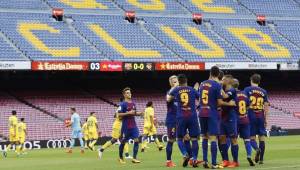 Barcelona decidió a último momento jugar el partido ante Las Palmas, pero a puerta cerrada. Los azulgranas se terminaron imponiendo 3-0. Fotos AFP y EFE