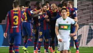Messi llevó al Barcelona al triunfo ante el Elche en juego atrasado de la Liga de España.