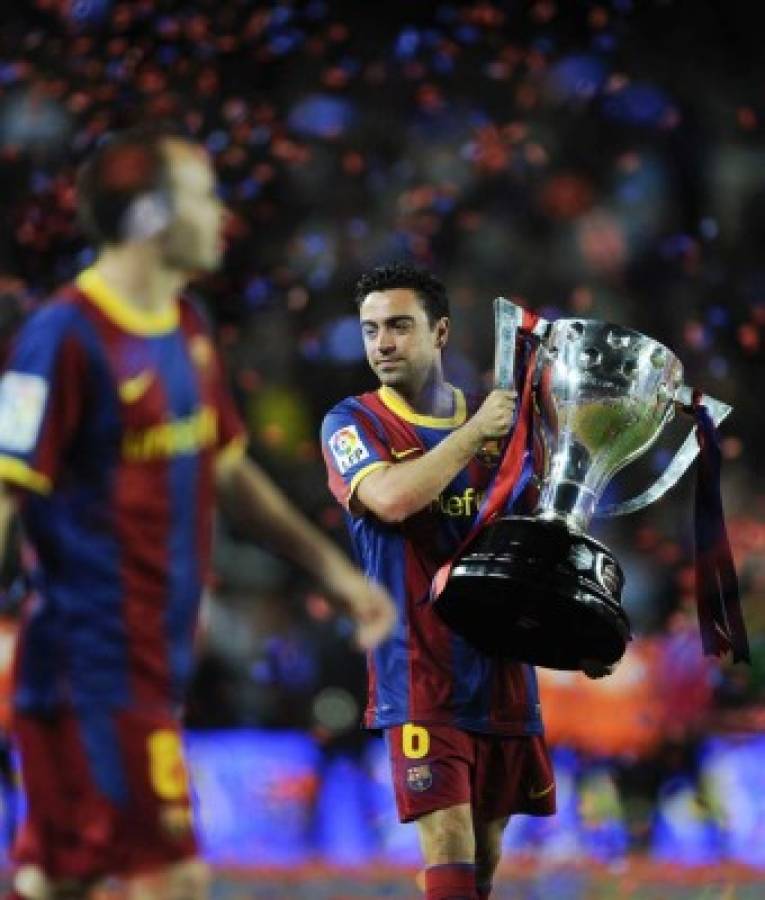 Las mejores 15 fotos inolvidables de Xavi Hernández en el Barcelona