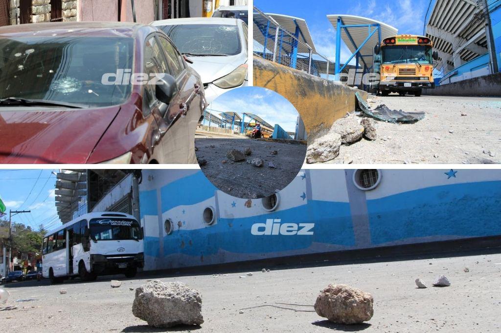 Carros destruidos, piedras y testimonios; así lucen las calles tras batalla entre aficionados de Motagua y Olimpia