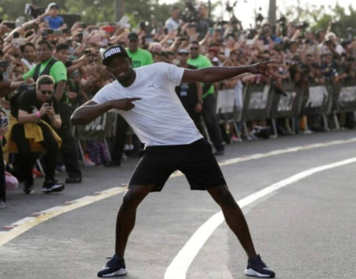 Las mejores imagenes de la carrera entre Usain Bolt y una Mototaxi