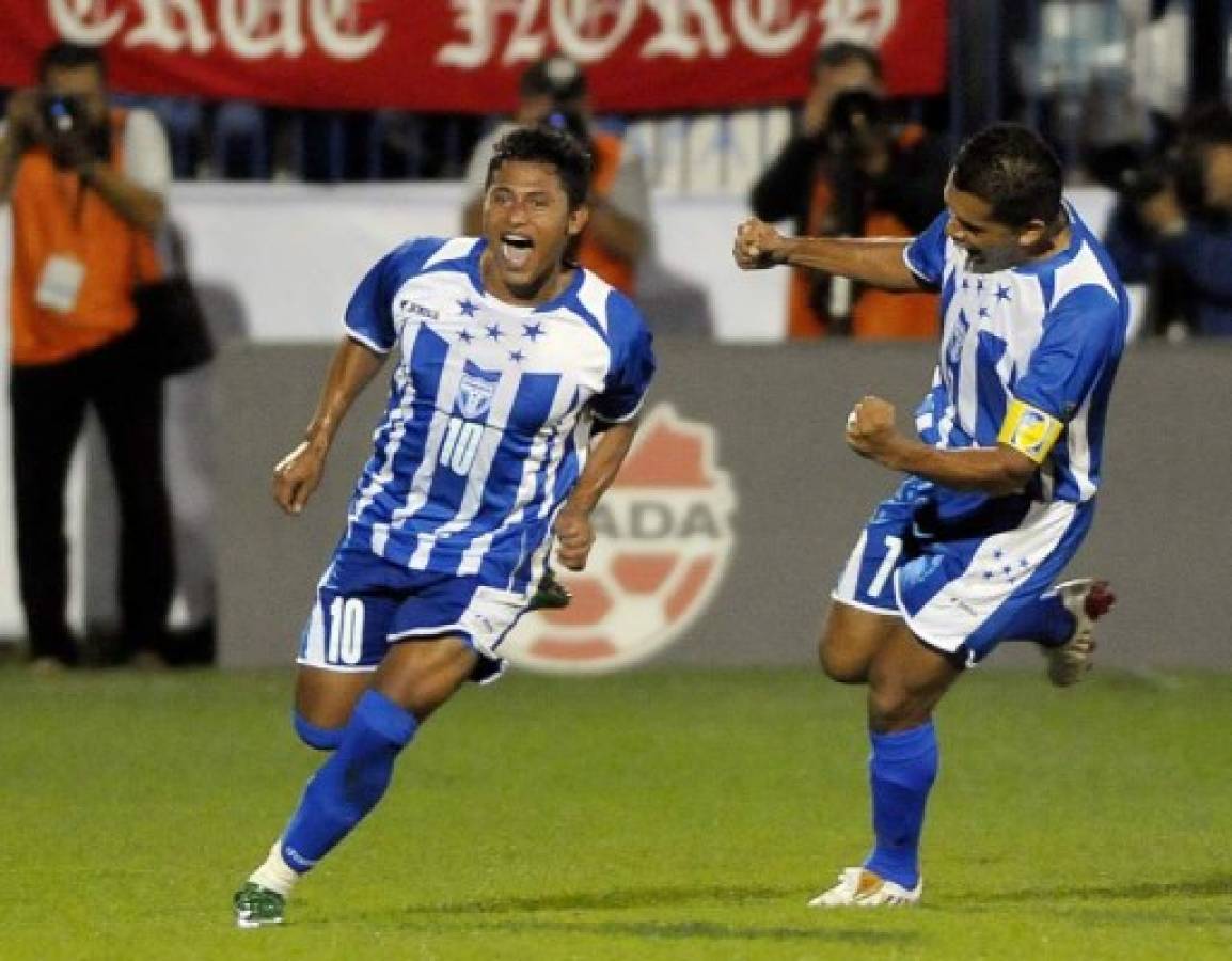 Ramon Nunez, of Honduras, left, celebrates with teammate Amado Guevara after scoring the winning goal to beat Canada 2-1 in their 2010 World Cup qualifying game in Montreal, Canada, Saturday, Sept. 6, 2008.