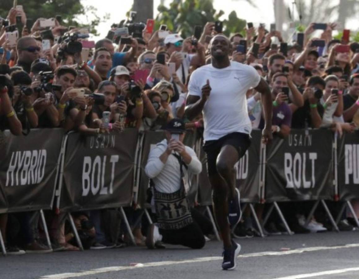Las mejores imagenes de la carrera entre Usain Bolt y una Mototaxi