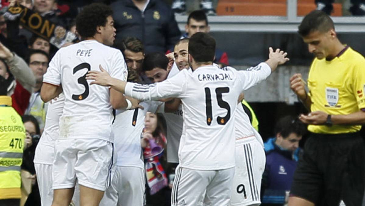 R. Madrid vence al Granada y es líder en España