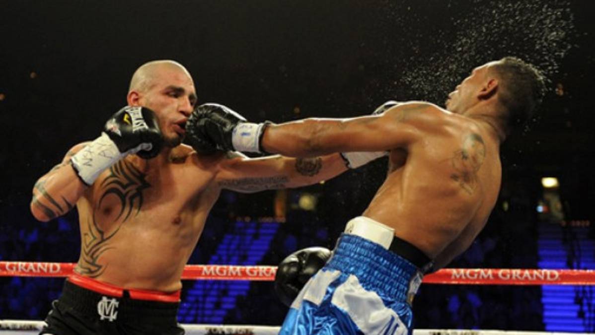 Miguel Cotto retuvo el título superwelter al vencer al nicaragüense Mayorga
