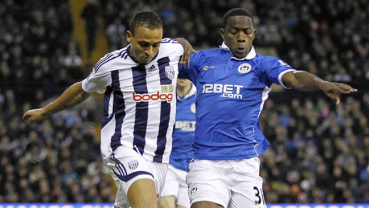 Figueroa y el Wigan respiran y salen del último lugar