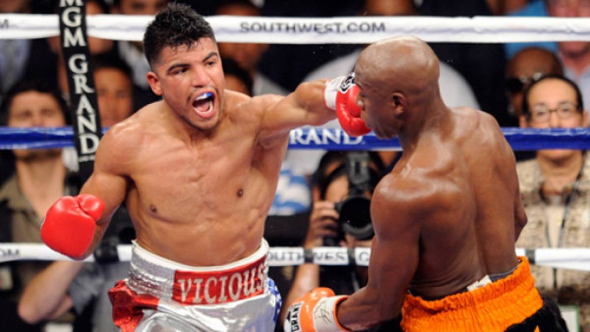 Mayweather Jr. y Ortiz dejaron más dudas e insultos que buen boxeo