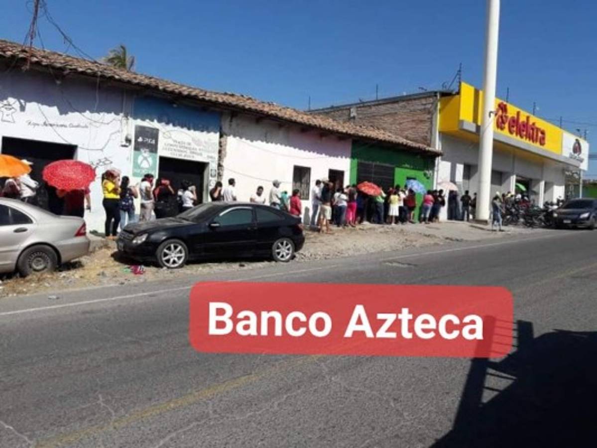 Hondureños abarrotan instituciones bancarias en medio del brote del covid-19