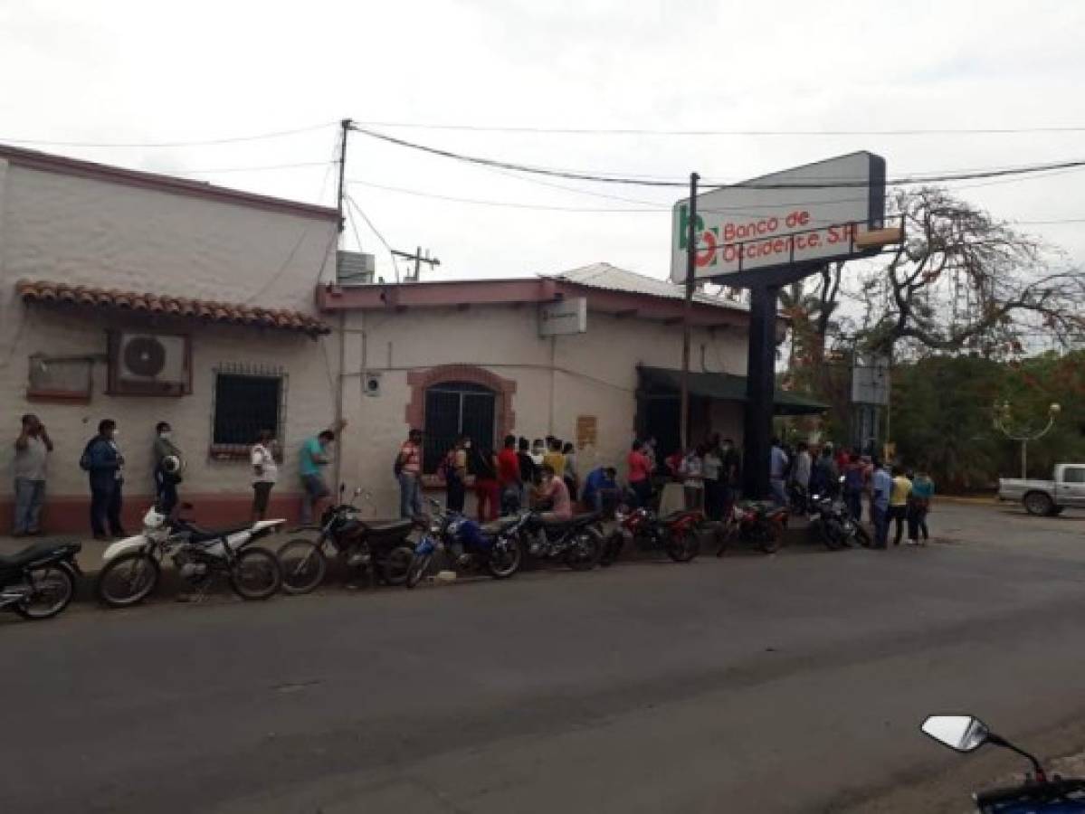 Fotos: Bancos y mercados abarrotados en plena crisis de coronavirus en Honduras