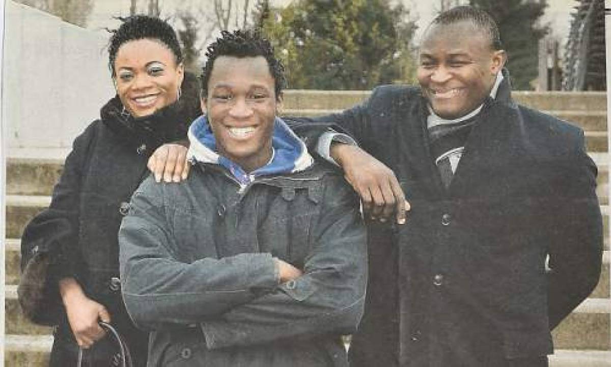 Footballer Romelu Lukaku as a teenager with his Mum Adolphine and Dad Roger. Collect picture from the headmaster's scrapbook