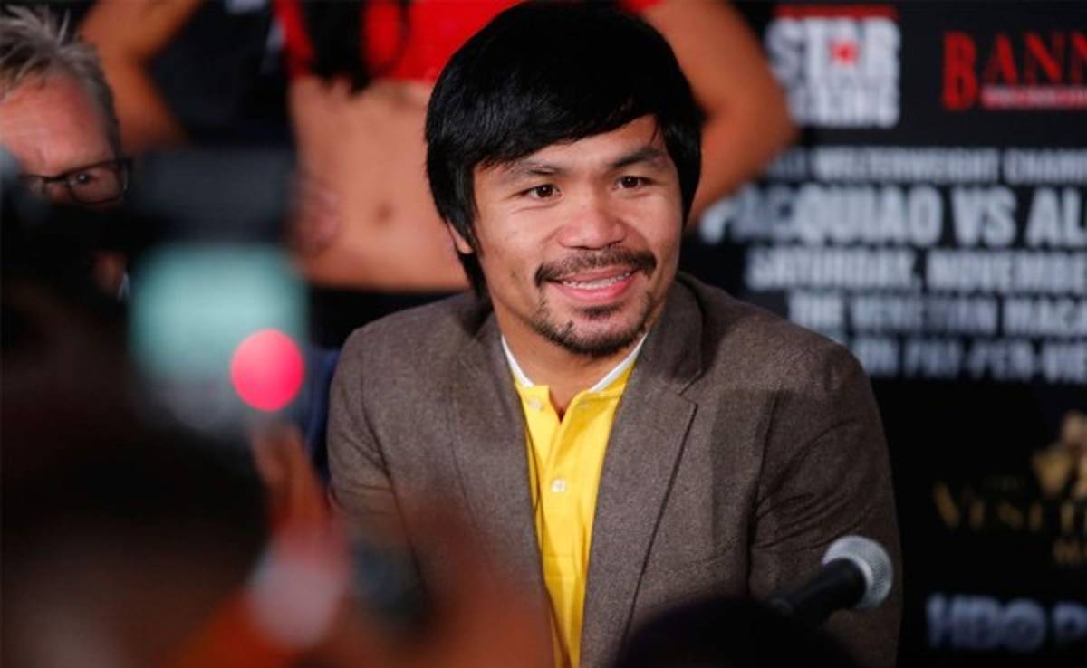 Pacquiao despide el 2014 y le pide a Mayweather hacer historia