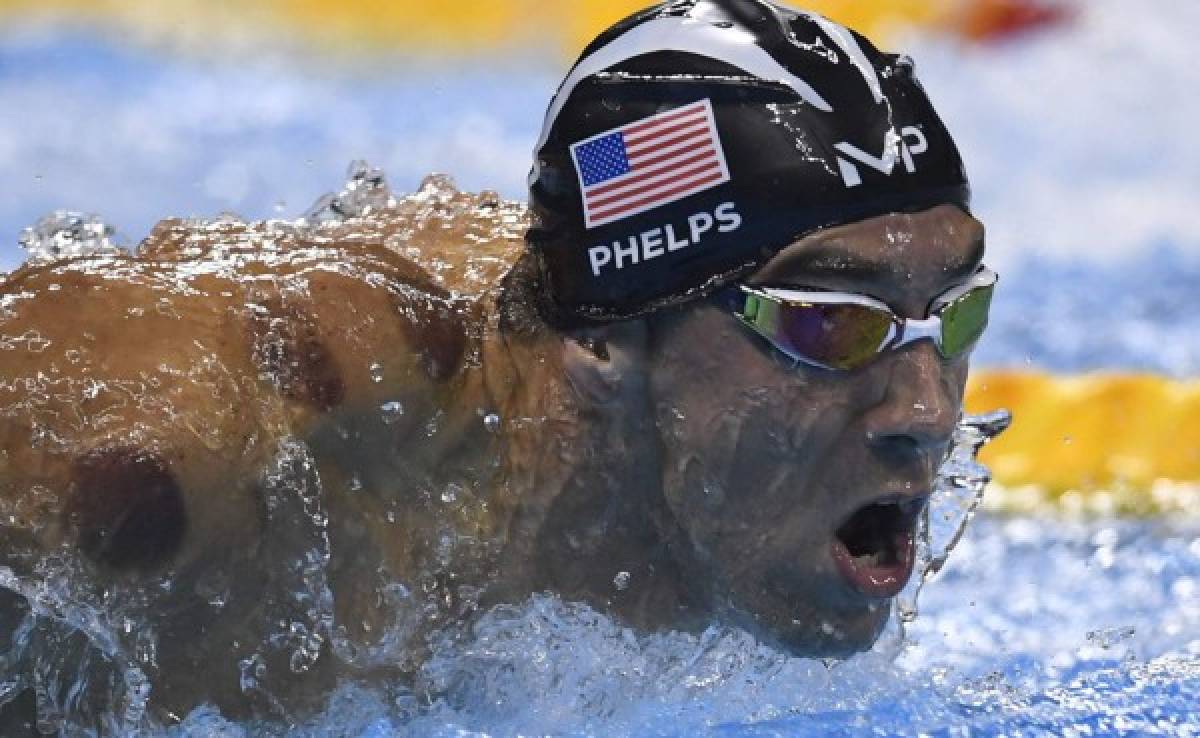 Michael Phelps amplia su historia y logra sus oro 20 y 21 en Olímpicos
