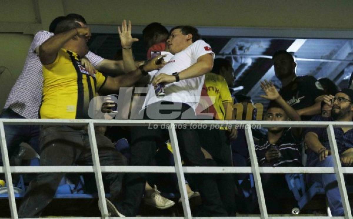 En fotos: Así fue la pelea entre aficionado del Olimpia y Real España en el palco