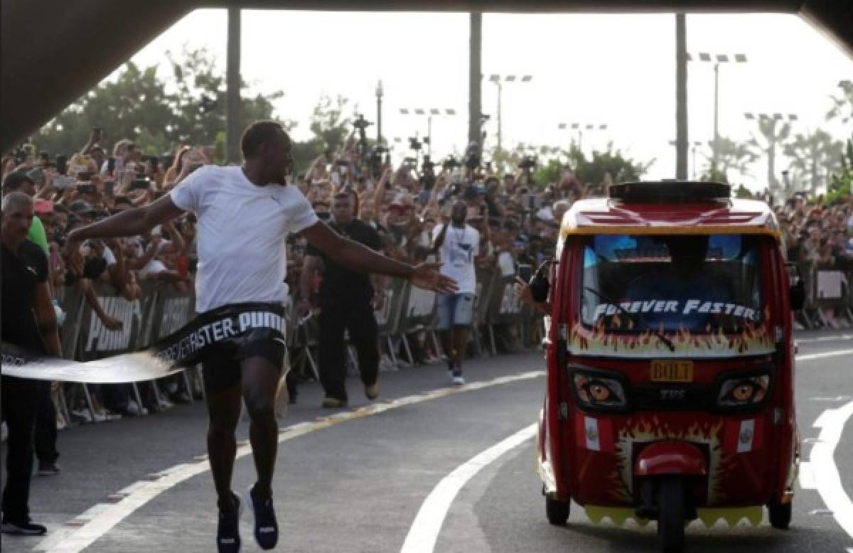 Las mejores imagenes de la carrera entre Usain Bolt y una Mototaxi