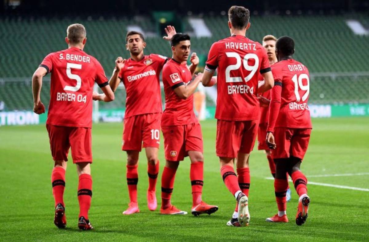 Leverkusen's German midfielder Kai Havertz (3rd R) celebrates scoring his second goal during the German first division Bundesliga football match Werder Bremen v Bayer 04 Leverkusen on May 18, 2020 in Bremen, northern Germany as the season resumed following a two-month absence due to the novel coronavirus COVID-19 pandemic. (Photo by Stuart FRANKLIN / POOL / AFP) / DFL REGULATIONS PROHIBIT ANY USE OF PHOTOGRAPHS AS IMAGE SEQUENCES AND/OR QUASI-VIDEO