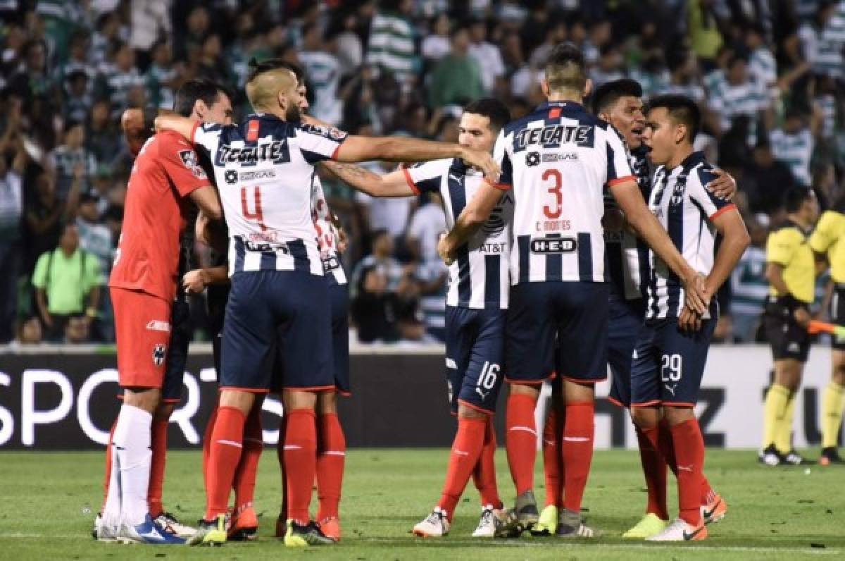 Monterrey's players celebrate winning their quarter final, second leg, Mexican Apertura 2019 tournament football match against Santos at TSM Corona stadium in Torreon, Coahuila state, Mexico on December 1, 2019. (Photo by ANDRES GALINDO / AFP)