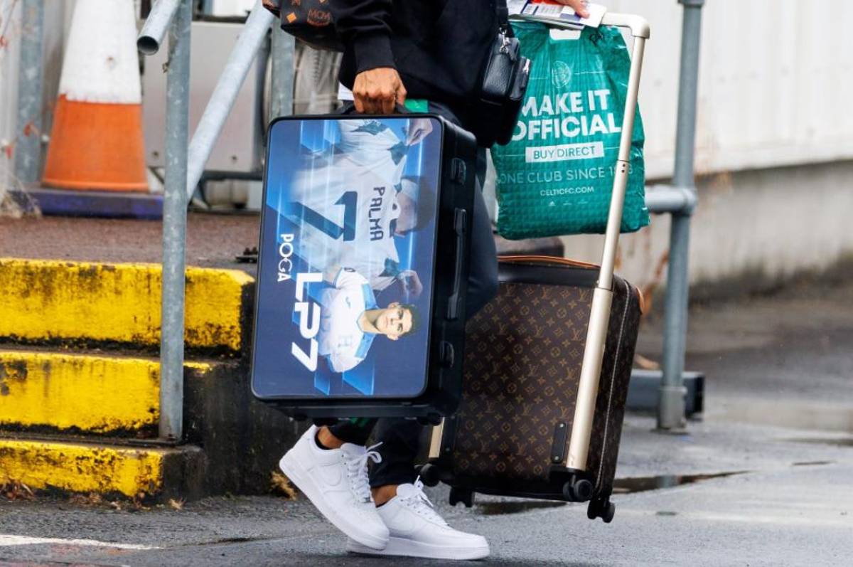 La maleta de Luis Palma que lleva su propia cara. FOTO: The Sun