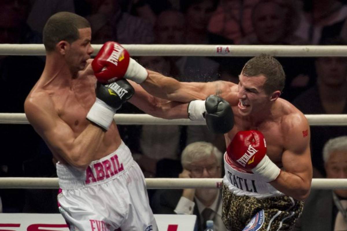 Richar Abril of Cuba (L) and Edis Tatli of Finland in action during WBA World Lightweight Championship match in Helsinki, Finland the 20 September 2014.