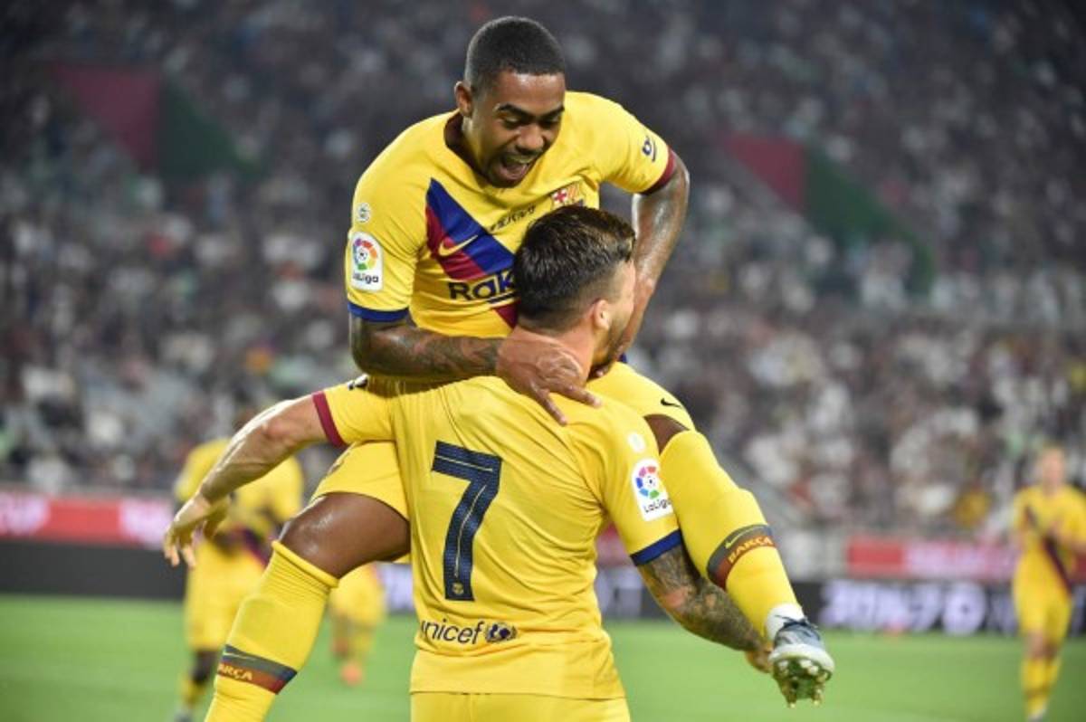 Fotos: El nuevo '7' del Barcelona, Iniesta y la emotiva noche en Japón