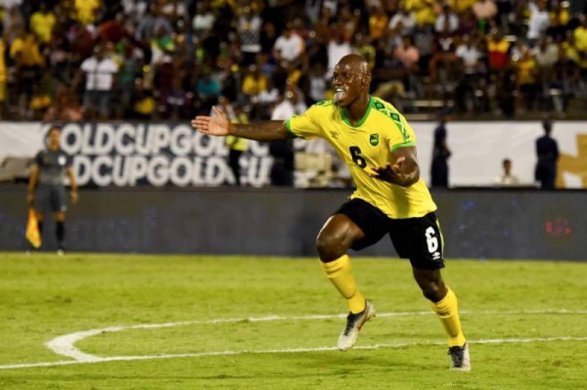 Jamaica's Dever Orgill celebrates after scoring a goal during the 2019 Concacaf Gold Cup match between Jamaica and Honduras, on June 17, 2019 at Independence Park in Kingston. (Photo by CHANDAN KHANNA / AFP)
