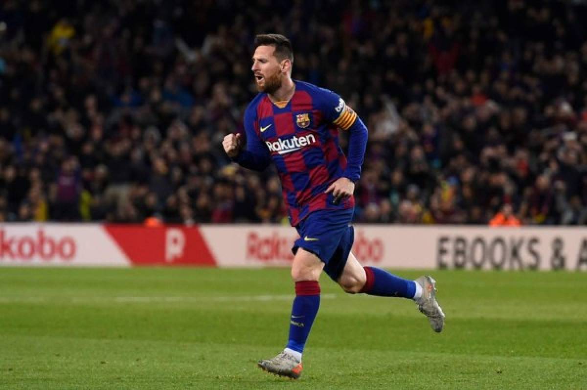 Barcelona's Argentine forward Lionel Messi celebrates after scoring during the Spanish league football match between FC Barcelona and RC Celta de Vigo at the Camp Nou stadium in Barcelona on November 9, 2019. (Photo by Josep LAGO / AFP)