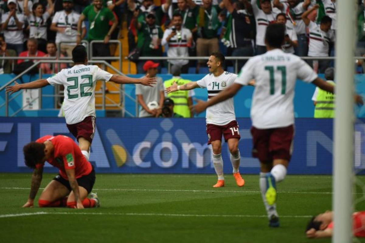 Mexico's forward Javier Hernandez (C) celebrates scoring their second goal during the Russia 2018 World Cup Group F football match between South Korea and Mexico at the Rostov Arena in Rostov-On-Don on June 23, 2018. / AFP PHOTO / Khaled DESOUKI / RESTRICTED TO EDITORIAL USE - NO MOBILE PUSH ALERTS/DOWNLOADS