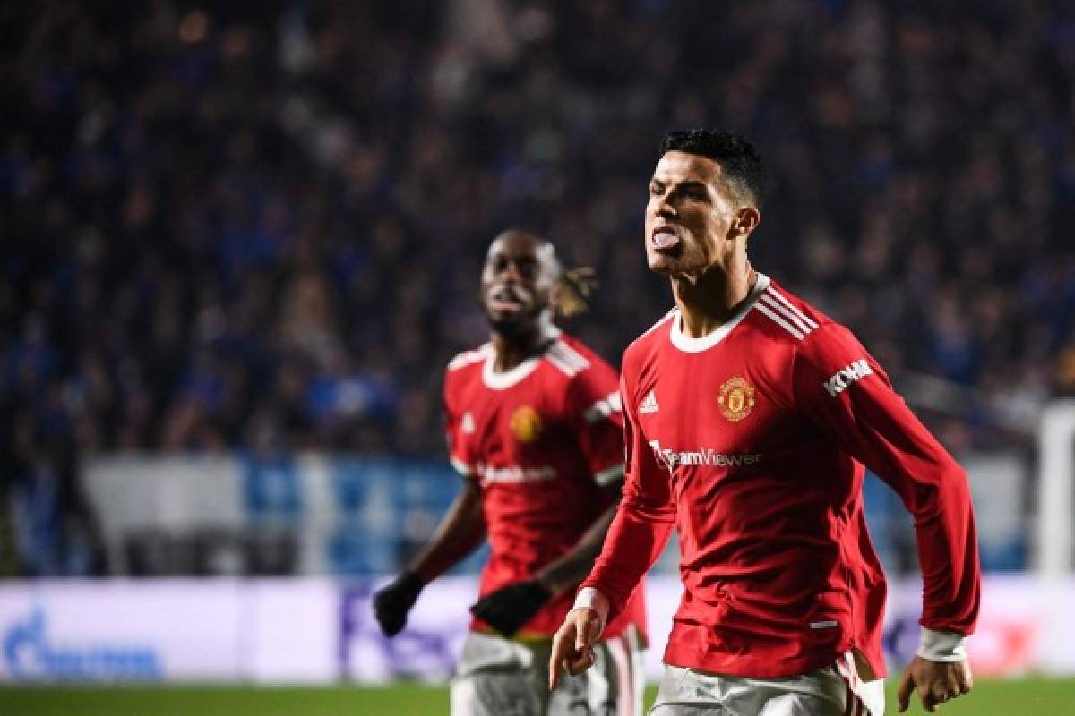 Manchester United's Portugal's forward Cristiano Ronaldo celebrates after scoring a goal during the UEFA Champions League group F football match between Atalanta and Manchester United at the Azzurri d'Italia stadium, in Bergamo, on November 2, 2021. (Photo by Marco BERTORELLO / AFP)