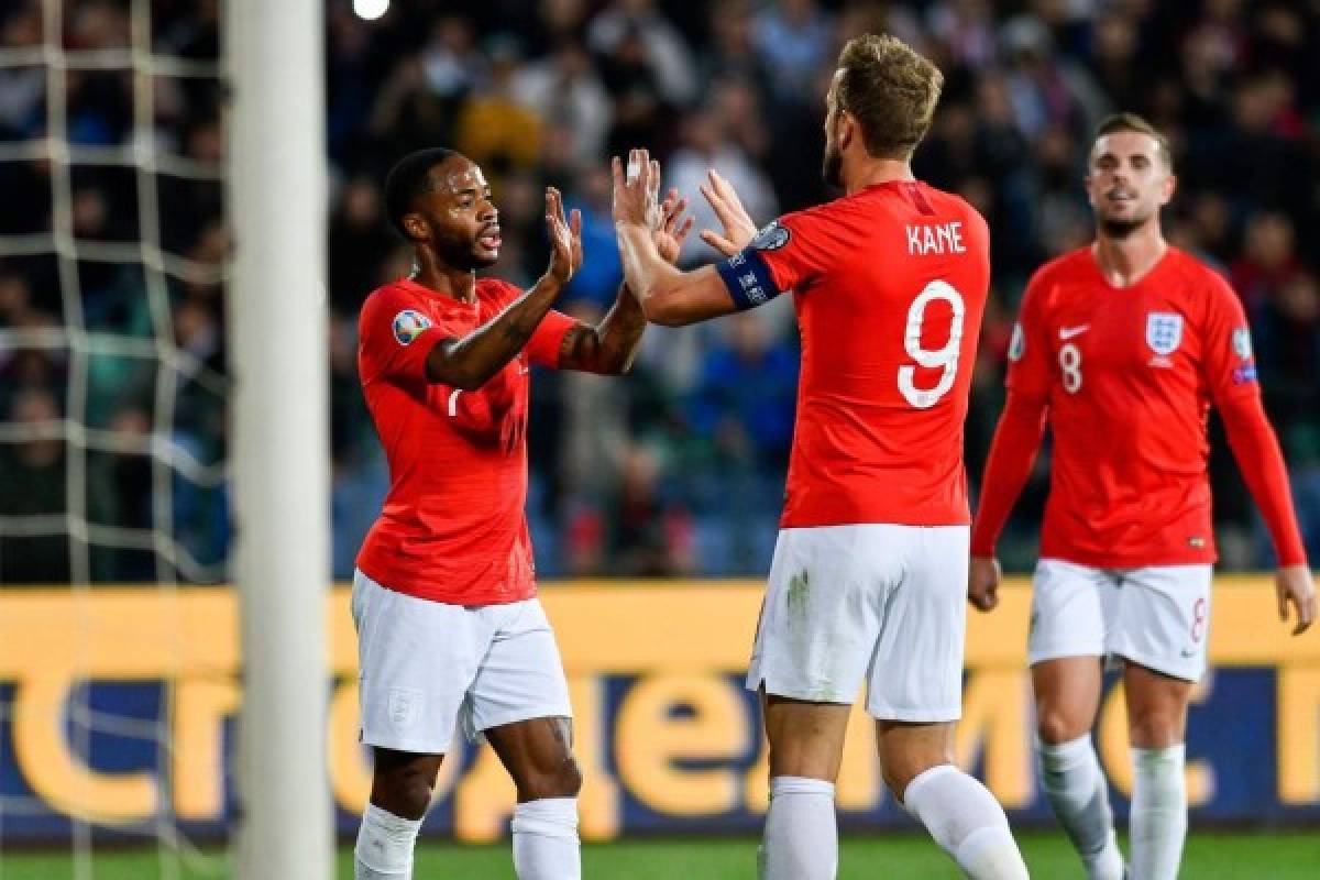England's forward Raheem Sterling (2nd-L) celebrates after scoring a goal during the Euro 2020 Group A football qualification match between Bulgaria and England due to incidents with fans, at the Vasil Levski National Stadium in Sofia on October 14, 2019. (Photo by NIKOLAY DOYCHINOV / AFP)