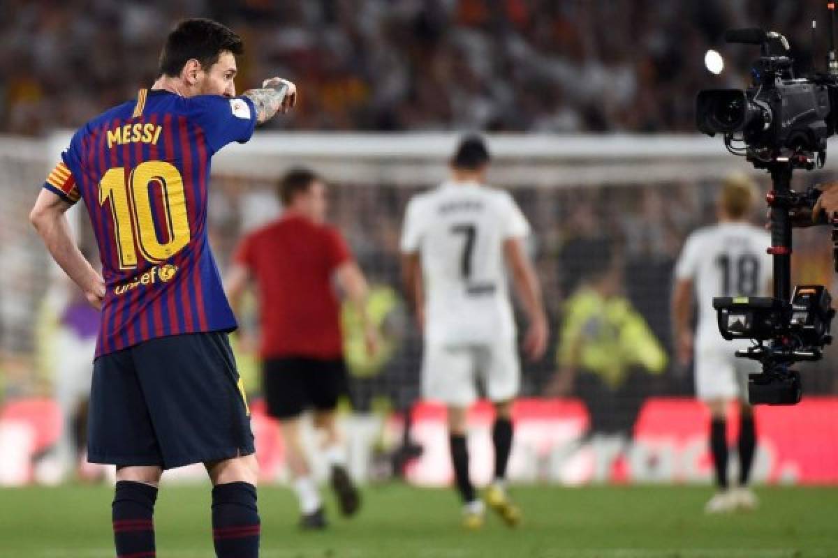 Barcelona's Argentinian forward Lionel Messi gestures at the end of the 2019 Spanish Copa del Rey (King's Cup) final football match between Barcelona and Valencia on May 25, 2019 at the Benito Villamarin stadium in Sevilla. (Photo by JOSE JORDAN / AFP)