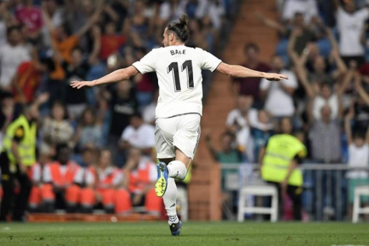 Real Madrid's Welsh forward Gareth Bale celebrates after scoring a goal during the Spanish league football match between Real Madrid CF and Club Deportivo Leganes SAD at the Santiago Bernabeu stadium in Madrid on September 1, 2018. / AFP PHOTO / GABRIEL BOUYS