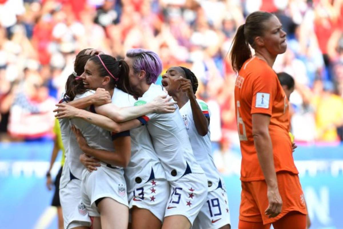 United States' midfielder Rose Lavelle celebrate scoring the 2-0 goal with her teammates during the France 2019 Women’s World Cup football final match between USA and the Netherlands, on July 7, 2019, at the Lyon Stadium in Lyon, central-eastern France. (Photo by Philippe DESMAZES / AFP)