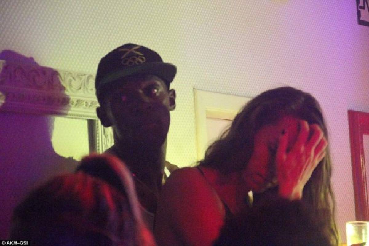 Escandalosas fotos de la fiesta de Usain Bolt ¡con una tercera mujer!