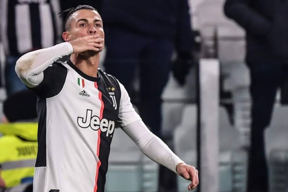 Juventus' Portuguese forward Cristiano Ronaldo celebrates after scoring his second goal during the Italian Serie A football match Juventus vs Parma on January 19, 2020 at the Juventus stadium in Turin. (Photo by Marco Bertorello / AFP)