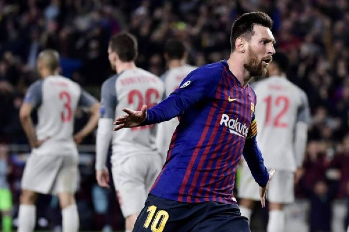 Barcelona's Argentinian forward Lionel Messi celebrates after scoring his team's third goal during the UEFA Champions League semi-final first leg football match between Barcelona and Liverpool at the Camp Nou Stadium in Barcelona on May 1, 2019. (Photo by JAVIER SORIANO / AFP)