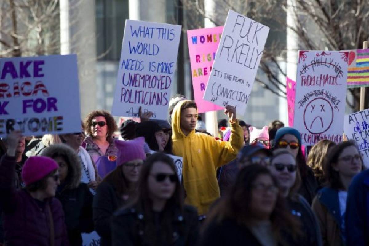 Sabrina Saunders of Littleton, Colorado, dressed in an outfit from The Handmaid's Tale, marches during during the Women's March in Denver, Colorado on January 19, 2019. - Thousands of women gathered across the United States for their annual message opposing Donald Trump and supporting women's rights. (Photo by Jason Connolly / AFP)