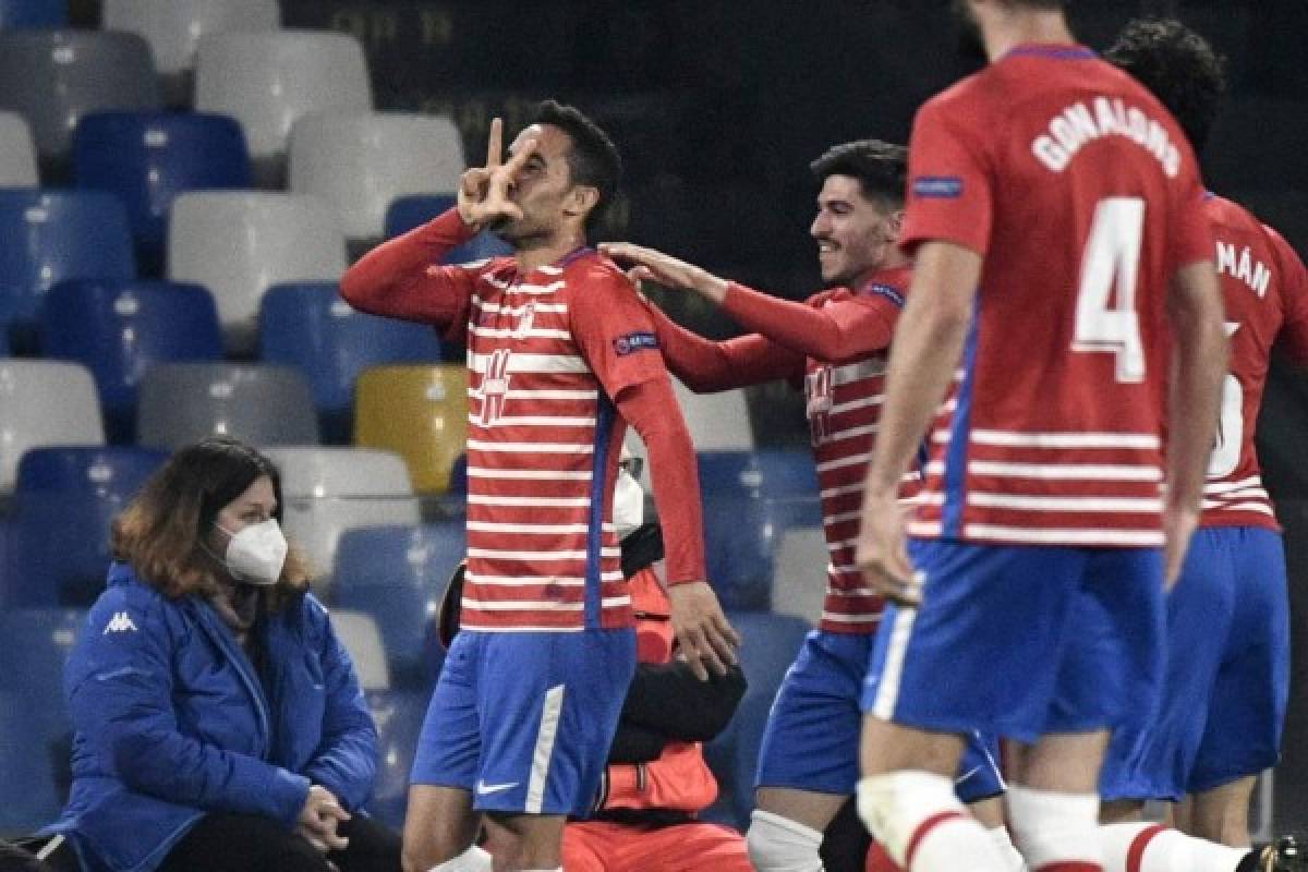 Granada's Spain's midfielder Angel Montoro celebrates after scoring an equalizer during the UEFA Europa League round of 32, 2nd leg football match Napoli vs Granada on February 25, 2021 at the Diego-Maradona stadium in Naples. (Photo by Filippo MONTEFORTE / AFP)
