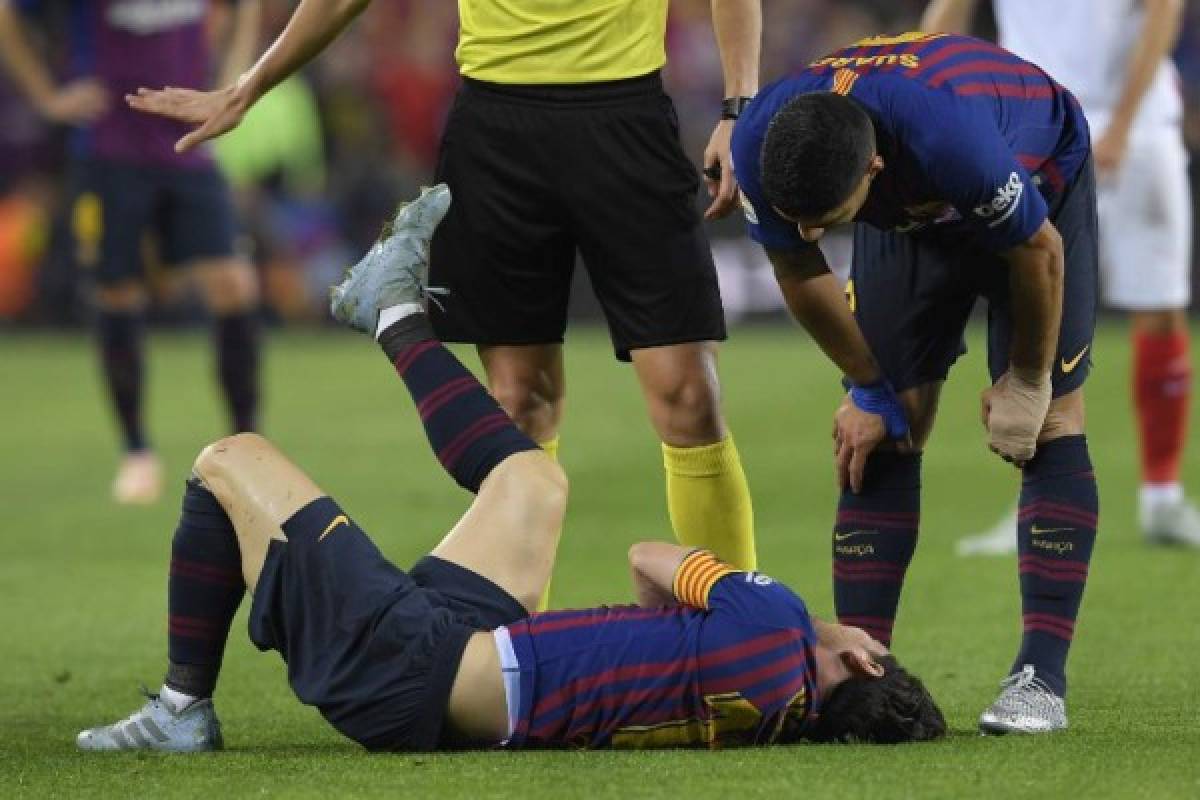 FOTOS: Así fue el sufrimiento de Messi tras su lesión ante Sevilla