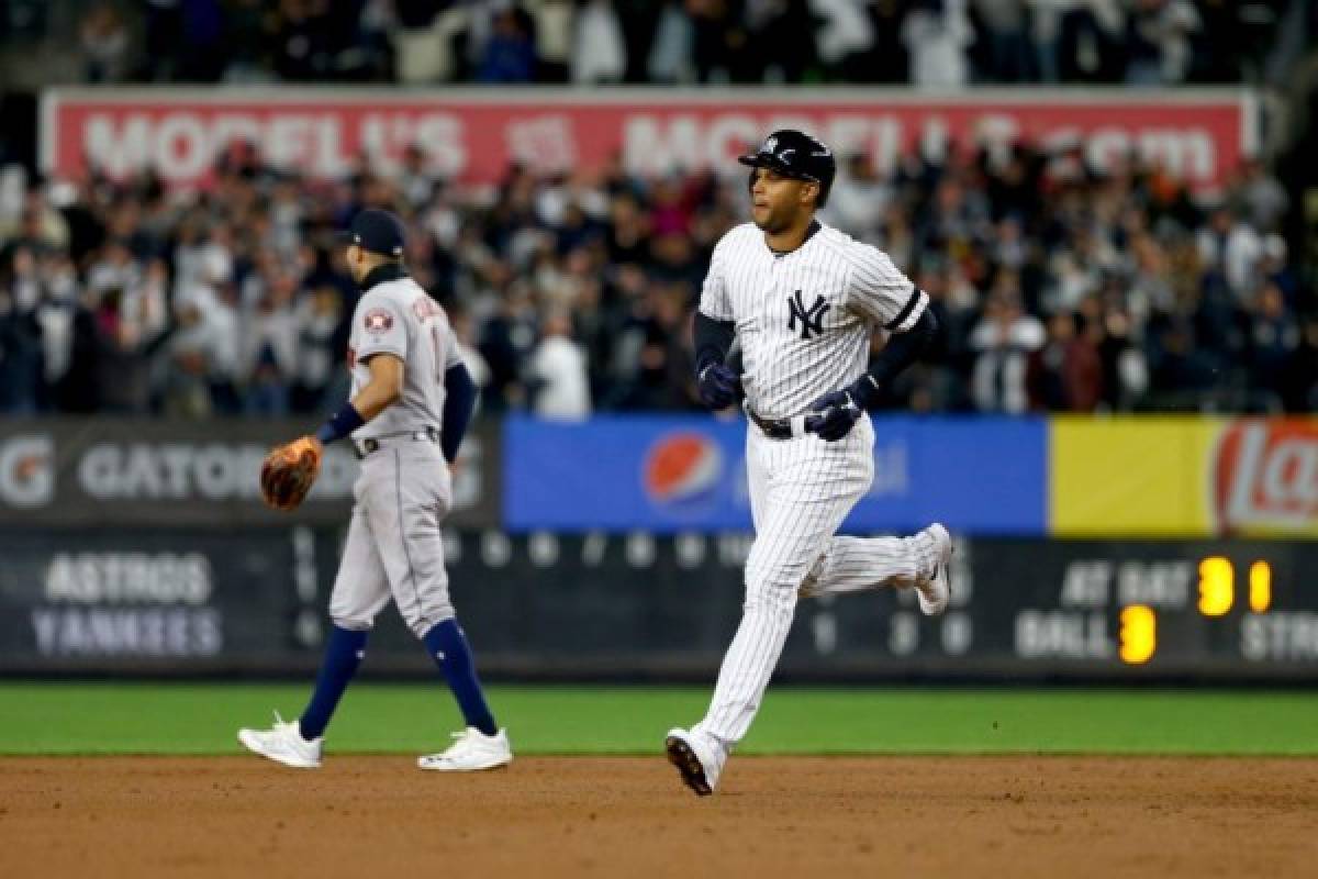 NEW YORK, NEW YORK - OCTOBER 18: Aaron Hicks #31 of the New York Yankees rounds the bases after hitting a three run home run against Justin Verlander #35 of the Houston Astros during the first inning in game five of the American League Championship Series at Yankee Stadium on October 18, 2019 in New York City. Mike Stobe/Getty Images/AFP