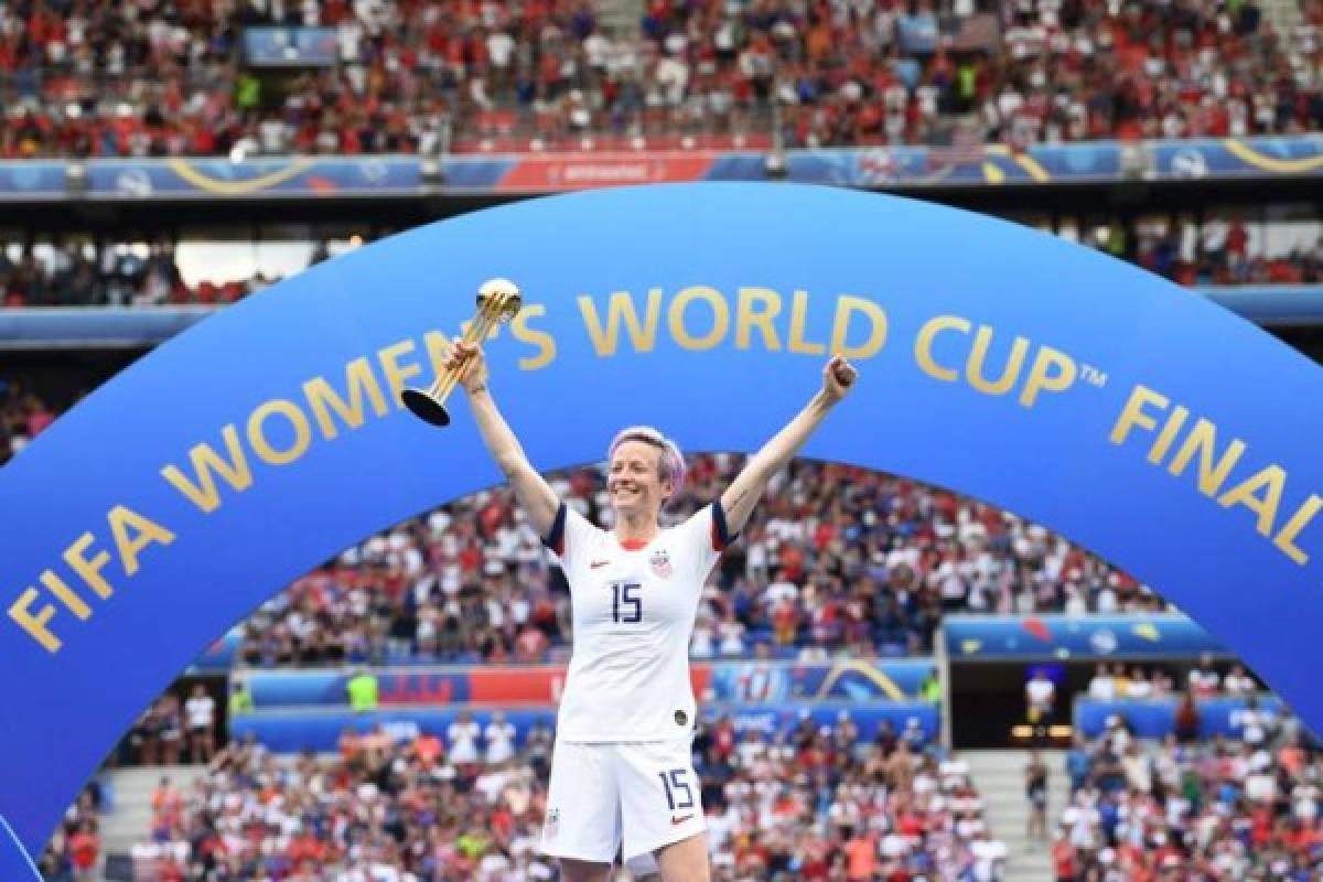 United States' forward Megan Rapinoe poses with the Golden Ball after the France 2019 Women’s World Cup football final match between USA and the Netherlands, on July 7, 2019, at the Lyon Stadium in Lyon, central-eastern France. (Photo by FRANCK FIFE / AFP)
