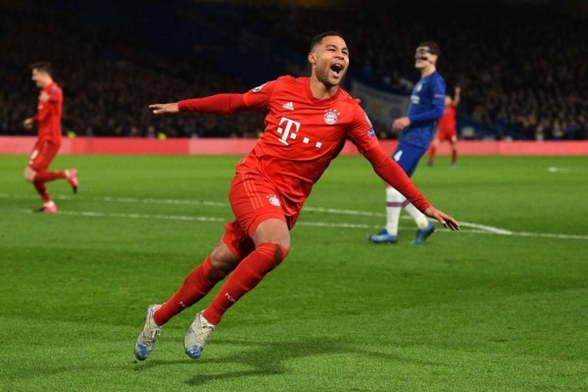 Bayern Munich's German striker Serge Gnabry celebrates after scoring their second goal during the UEFA Champion's League round of 16 first leg football match between Chelsea and Bayern Munich at Stamford Bridge in London on February 25, 2020. (Photo by Glyn KIRK / AFP)