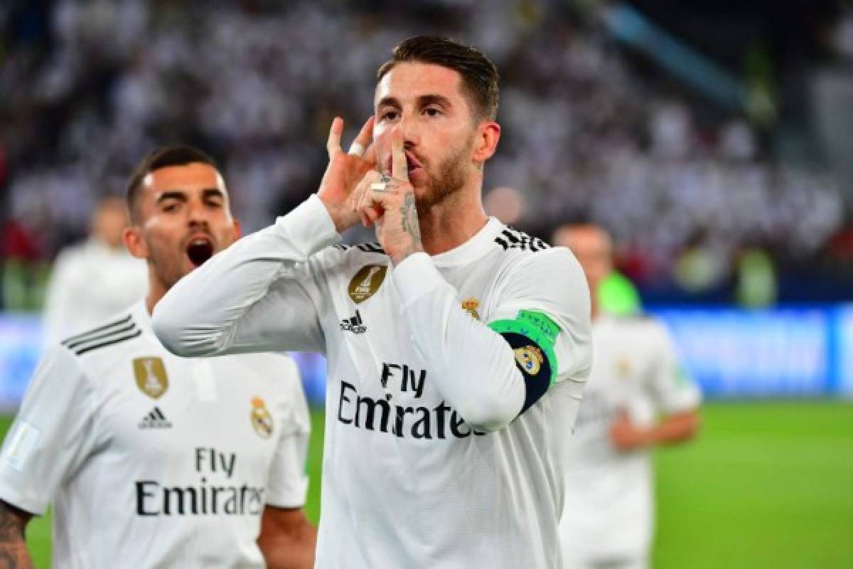 Real Madrid's Spanish defender Sergio Ramos celebrates after scoring a goal during the FIFA Club World Cup final football match Spain's Real Madrid vs Abu Dhabi's Al Ain at the Zayed Sports City Stadium in Abu Dhabi, the capital of the United Arab Emirates, on December 22, 2018. (Photo by Giuseppe CACACE / AFP)