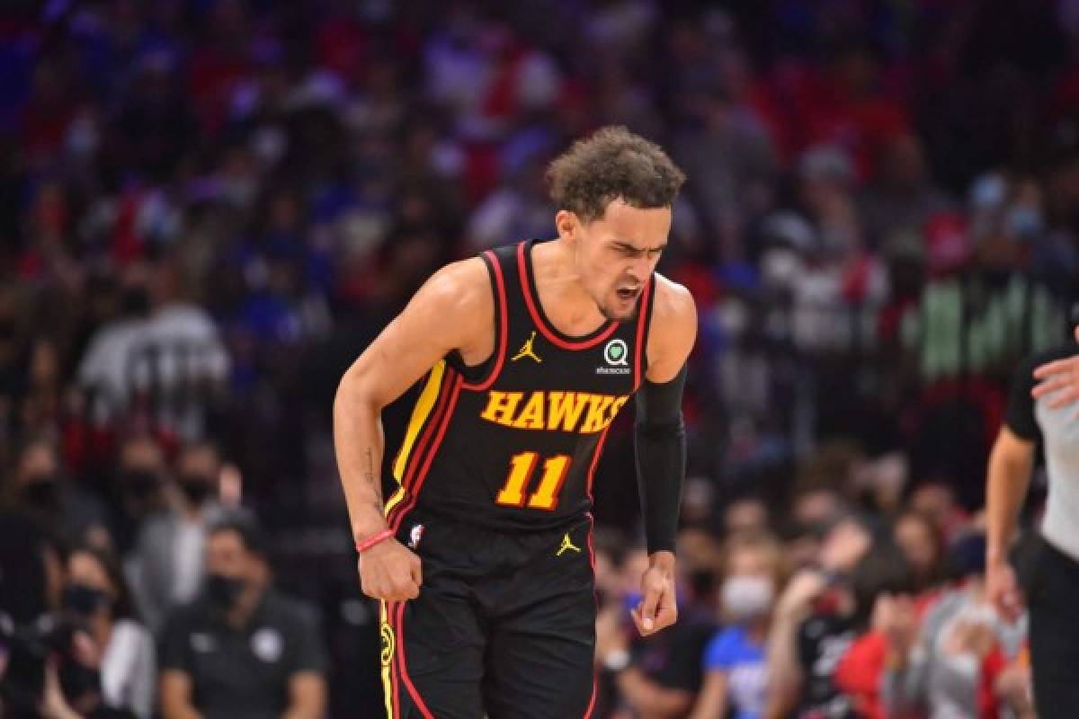 PHILADELPHIA, PA - JUNE 6: Trae Young #11 of the Atlanta Hawks reacts during a game against the Philadelphia 76ers during Round 2, Game 1 of the Eastern Conference Playoffs on June 6, 2021 at Wells Fargo Center in Philadelphia, Pennsylvania. NOTE TO USER: User expressly acknowledges and agrees that, by downloading and/or using this Photograph, user is consenting to the terms and conditions of the Getty Images License Agreement. Mandatory Copyright Notice: Copyright 2021 NBAE Jesse D. Garrabrant/NBAE via Getty Images/AFP (Photo by Jesse D. Garrabrant / NBAE / Getty Images / Getty Images via AFP)