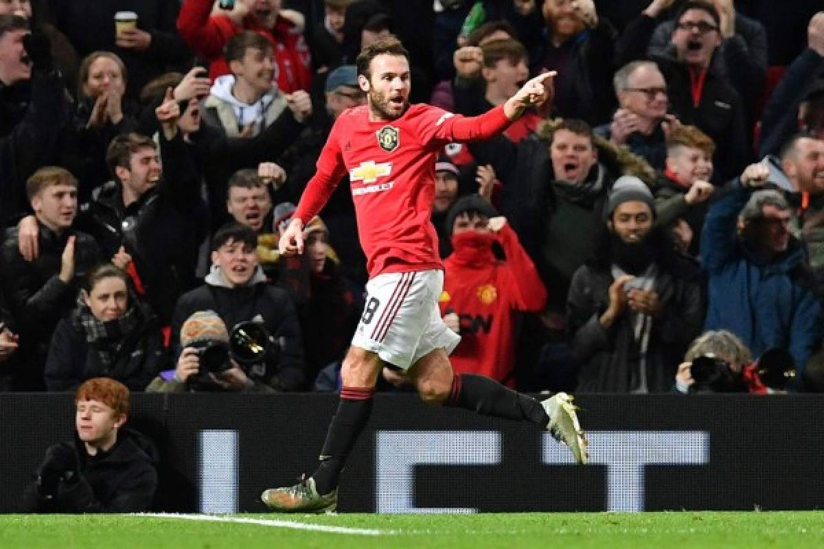 Manchester United's Spanish midfielder Juan Mata celebrates scoring the opening goalduring the English FA Cup third round-replay football match between Manchester United and Wolverhampton Wanderers at Old Trafford in Manchester, north west England, on January 15, 2020. (Photo by Paul ELLIS / AFP) / RESTRICTED TO EDITORIAL USE. No use with unauthorized audio, video, data, fixture lists, club/league logos or 'live' services. Online in-match use limited to 120 images. An additional 40 images may be used in extra time. No video emulation. Social media in-match use limited to 120 images. An additional 40 images may be used in extra time. No use in betting publications, games or single club/league/player publications. /
