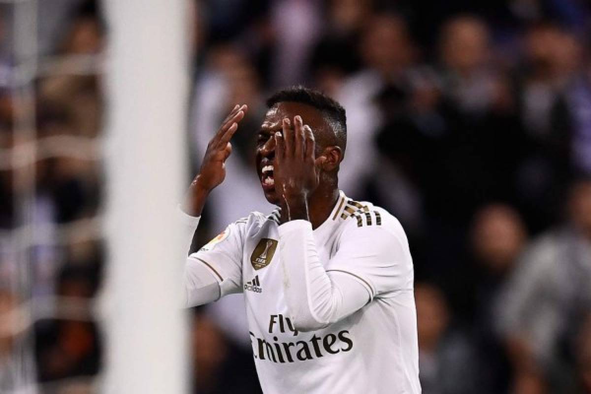 Real Madrid's Brazilian forward Vinicius Junior reacts after missing a goal opportunity during the Spanish League football match between Real Madrid CF and Real Betis at the Santiago Bernabeu stadium in Madrid, on November 2, 2019. (Photo by OSCAR DEL POZO / AFP)
