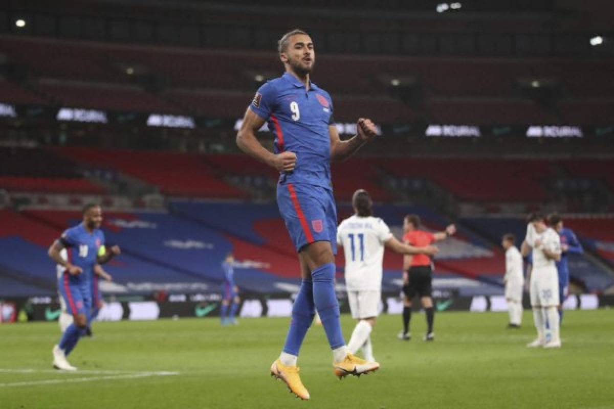 England's striker Dominic Calvert-Lewin celebrates scoring their second goal during the FIFA World Cup Qatar 2022 qualification football match between England and San Marino at Wembley Stadium in London on March 25, 2021. (Photo by CARL RECINE / POOL / AFP) / NOT FOR MARKETING OR ADVERTISING USE / RESTRICTED TO EDITORIAL USE