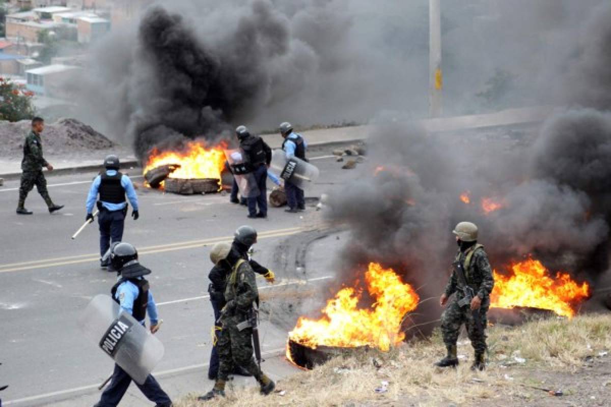 Bloqueos de calles y enfrentamientos dejan protestas en Honduras