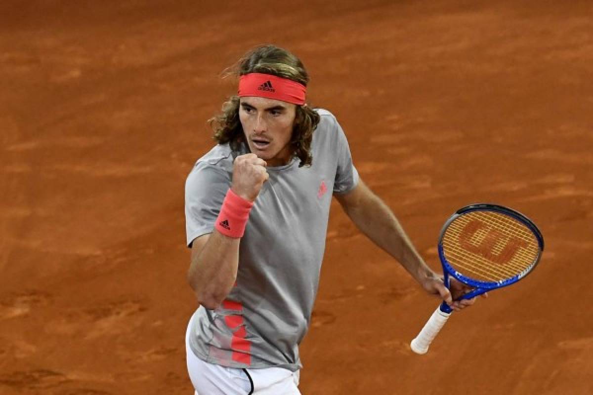 Greece's Stefanos Tsitsipas celebrates winning a point against Spain's Rafael Nadal during their ATP Madrid Open semi-final tennis match at the Caja Magica in Madrid on May 11, 2019. (Photo by OSCAR DEL POZO / AFP)