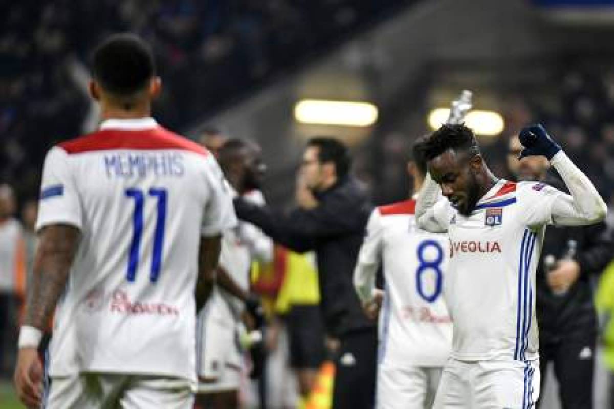 Lyon's Ivorian forward Maxwell Cornet celebrates after scoring a goal during the UEFA Champions League Group F football match between Olympique Lyonnais and Manchester City at the Parc Olympique Lyonnais stadium in Decines-Charpieu, central-eastern France, on November 27, 2018. (Photo by JEFF PACHOUD / AFP)