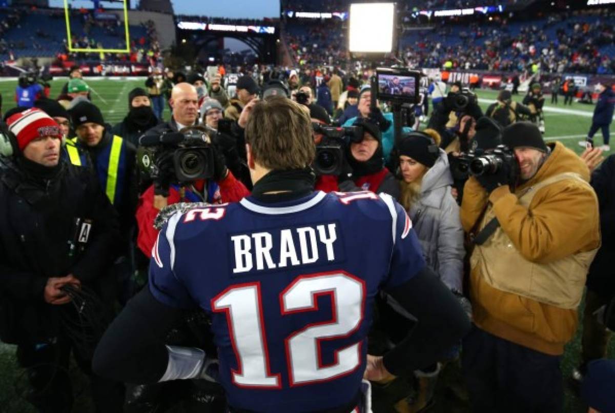 FOXBOROUGH, MASSACHUSETTS - JANUARY 13: Tom Brady #12 of the New England Patriots is interviewed after the AFC Divisional Playoff Game against the Los Angeles Chargers at Gillette Stadium on January 13, 2019 in Foxborough, Massachusetts. Adam Glanzman/Getty Images/AFP